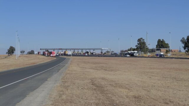 Villiers, South Africa - June 12, 2026: Trucks and traffic pass through Wilge Toll Plaza on N3 highway