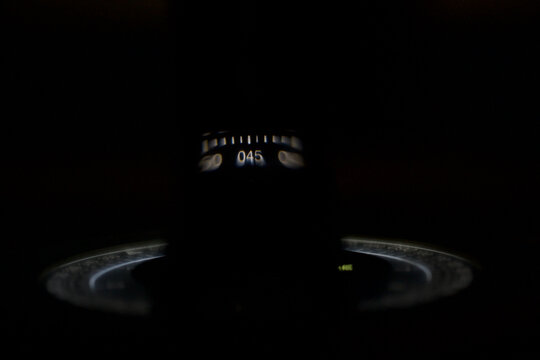 Closeup view of gyro compass at night