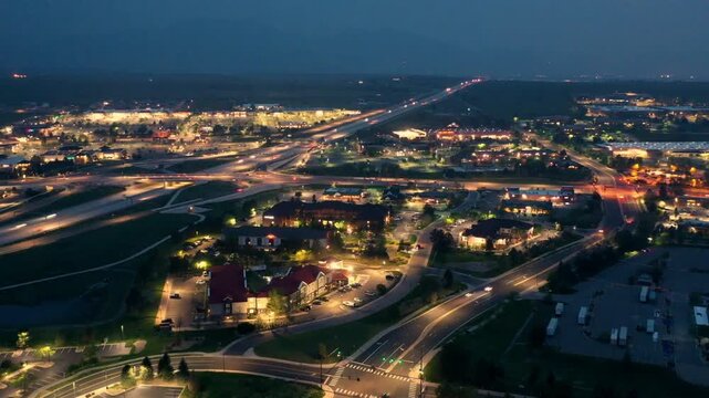 Hyperlapse Drone shot of boulder Colorado at night showing highways and the city