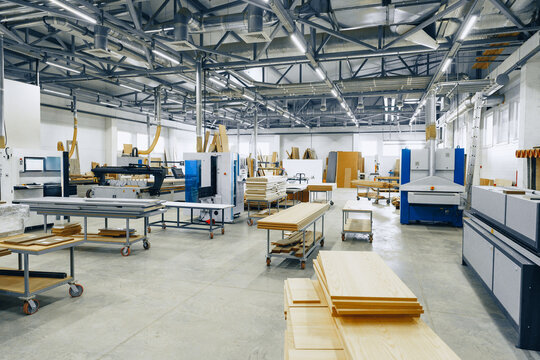 Furniture workshop with machines and materials for making wooden items