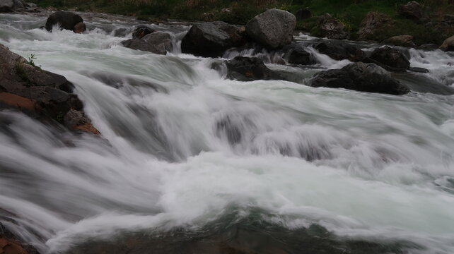 Beautiful silk-like mountain stream rushing over rocks