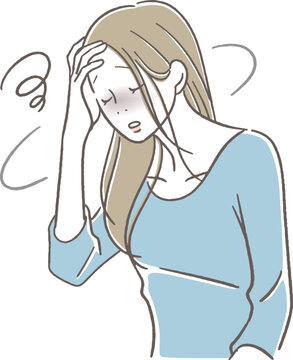目眩がする女性
