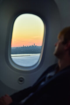 East River and Manhattan Skyline with Sunrise as seen from a Plane, New York City, USA