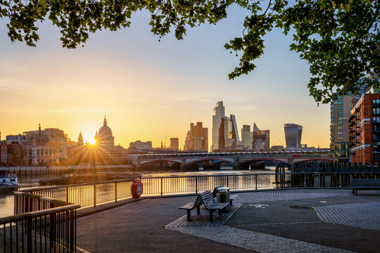 Beautiful summer sunrise view of the skyline of the City of London, England, seen from Southbank without people