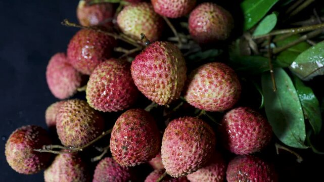 healthy seasonal ripe lychees with water droplets and farm fresh appearance