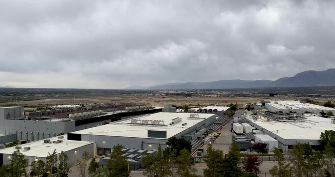 DataBank Granite Point Campus data center in Bluffdale, Utah on an overcast day with the Great Salt Lake Valley in the distance - aerial flyover