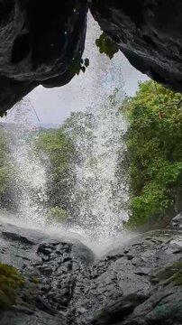 Waghbil cave waterfall or Tiger's cave waterfall in slow motion at near Mumbai, Maharashtra