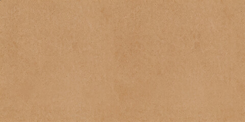 Fototapeta premium A close-up macro photograph of textured light brown kraft paper, revealing its fibrous surface and natural, earthy feel.