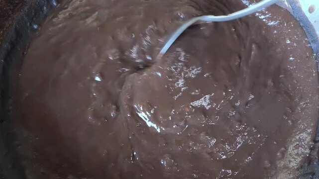 Cooking  sweet potato with cocoa sauce , indoor Chiangmai Thailand.