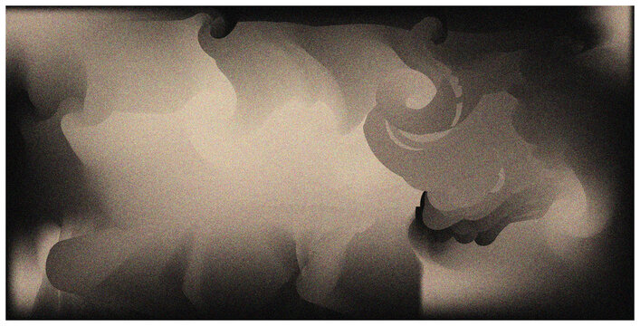 Coiled spring in grayscale abstract metallic form with soft shadows