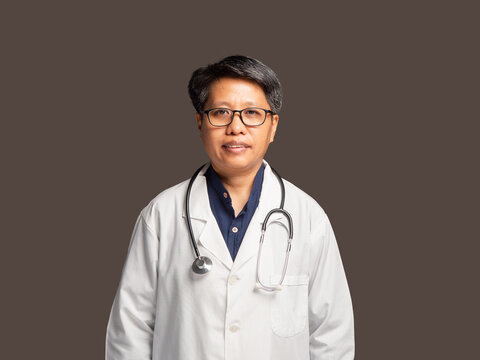 Female doctor standing confidently in white coat