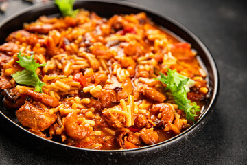 Fototapeta premium chicken and shrimp dish, tomato sauce fresh seafood tasty snack fresh delicious gourmet food background rustic food on the table, top view, copy space