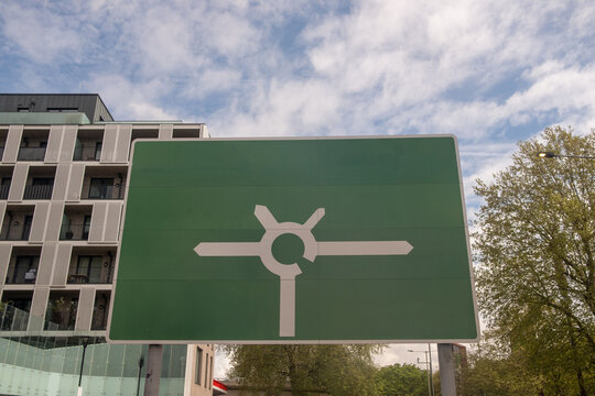 LONDON - blank green UK roundabout road sign with places removed