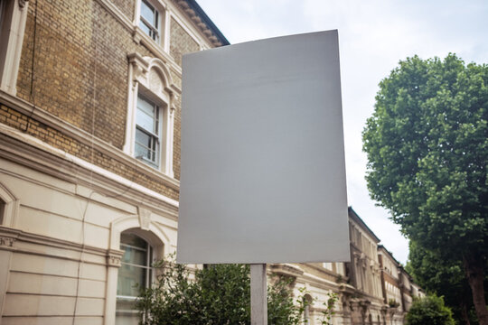 LONDON - blank white property sign on residential street