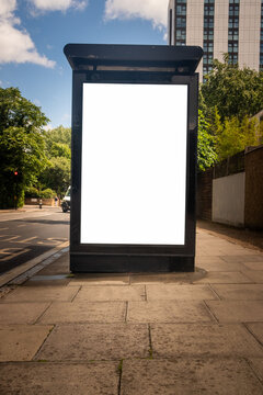 LONDON - blank advertising panel at bus stop on city street