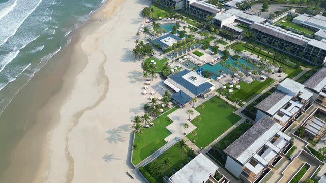 Magnificent Elite Beachfront Resort Danang Vietnam Green Lawns And Pools Drone Track Overhead 4K 30FPS