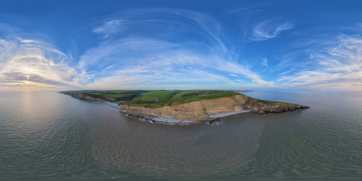 Aerial 360&deg; Panorama Capturing Coastal Cliffs, Countryside, and Ocean Horizon in South Wales, United Kingdom