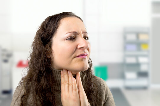Sore throat, stress and mature businesswoman in office with sickness, illness or allergy symptoms. Migraine, burnout and female person with fatigue, exhaustion or tiredness in workplace for career.