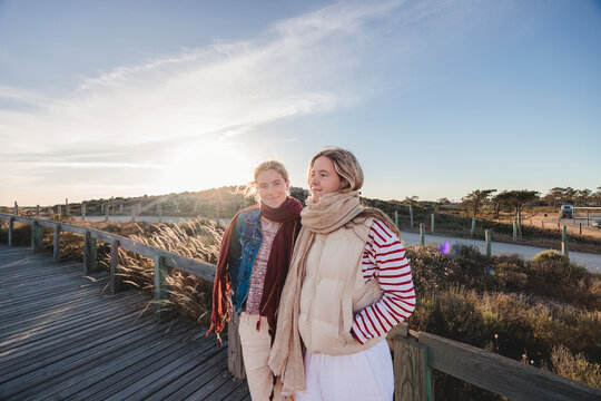 Two young women with effortless personal style and natural light