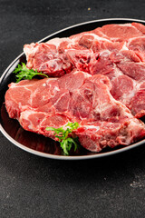 Fototapeta premium Raw pork steak pork tenderloin, food preparation lunch or dinner tasty organic snack fresh farm product delicious gourmet food background on the table rustic food, top view copy space