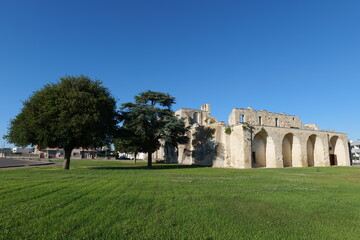 Obraz premium The building of an ancient church in Melpignano, a medieval town in the province of Lecce, Italy.