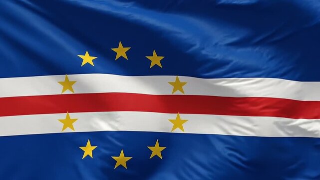 The flag of Cape Verde waving in the wind, a symbol of national pride and identity, with its distinctive blue, white, and red stripes and yellow stars