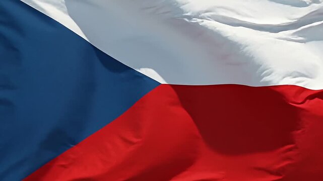 Close up of the Czech Republic flag waving in the wind with detailed fabric texture and shadows creating depth