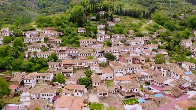 Amazing aerial view of the historic village of Sirince in Turkey. Famous tourist destination with traditional stone houses on a green hill