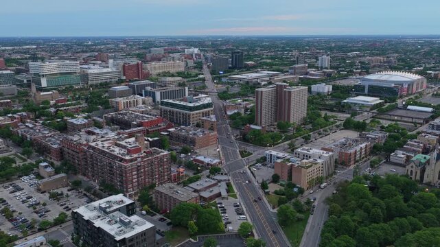 Urban aerial landscape above West Loop residential area toward United Center in Chicago, city planning, modern apartment buildings, Illinois Medical District