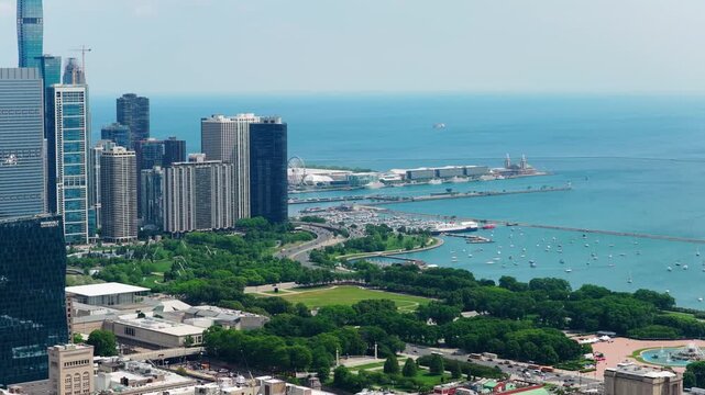 Chicago's downtown skyline and magnificent waterfront showing Navy Pier, Millennium Park, Lake Michigan and Monroe Harbor in iconic urban landscape