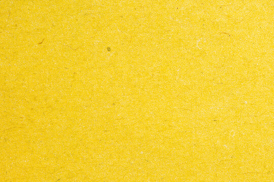 Macro Newspaper Print Paper With Yellow Ink Texture