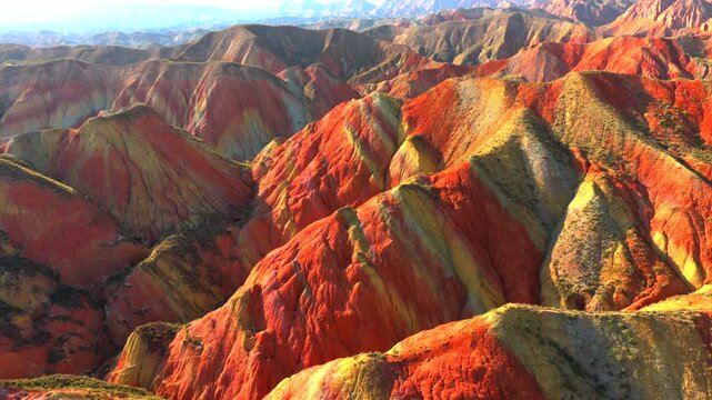 Aerial view, Cinematic drone, Zhangye Danxia, Lanzhou Danxia, Rainbow mountains, Colorful rock formations, Layered stratigraphy, Desert landscape, Canyon texture, Erosion patterns, Geological wonder,