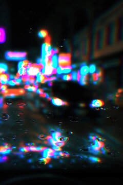 Nighttime City Street with Raindrops on Windshield Distorted by Chromatic Aberration Effect