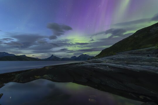 Northern lights at dawn over S&oslash;rfolda Fjord near Kjerring&oslash;y between Bod&oslash; and S&oslash;rfold in Norway