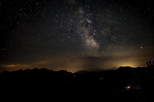 Starry sky with the Milky Way over the Chiemgau Alps, view towards Loferer Steinberge and Kitzb&uuml;hler Horn, Bavaria, Germany