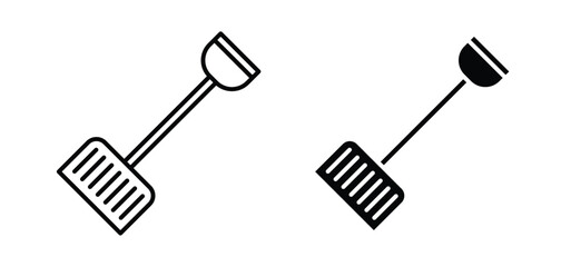Snow shovel vector icon set black filled and outlined style. © tara