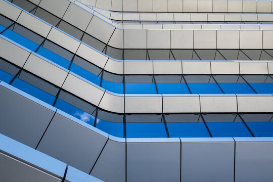 Abstract architectural detail of MOL Campus facade against blue sky in Budapest