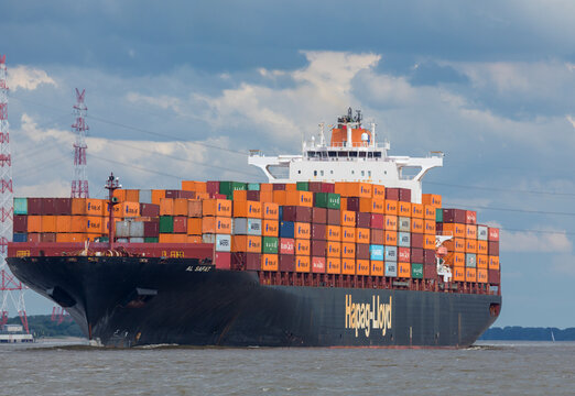 Stade, Germany &ndash; June 6, 2026: Container ship AL SAFAT, owned and operated by Hapag-Lloyd, sailing on Elbe river towards the North Sea