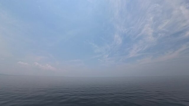 Cinematic 4K real-time POV from the bow of a 500-ton vessel cutting through calm ocean waves at sunrise.