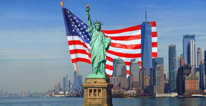Panoramic view of New York City featuring the Statue of Liberty, with the US flag in the background. View from Staten Island. Large-format panorama.
