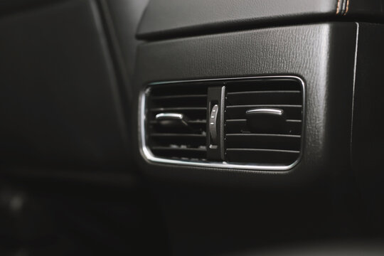 Close up car ventilation system and air conditioning controls of modern car. concept transport travel.	