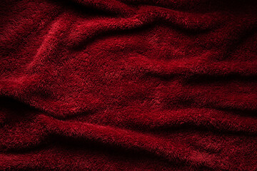 Elegant crimson plush fabric background folds © solidmaks