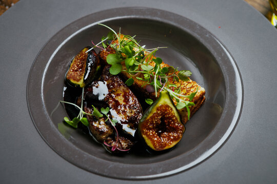 Close up of seared foie gras with figs and brioche toast