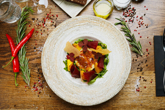 Baked goat cheese salad with roasted beets and citrus