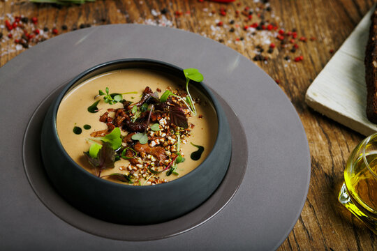 Wild mushroom cream with buckwheat and herbal oil