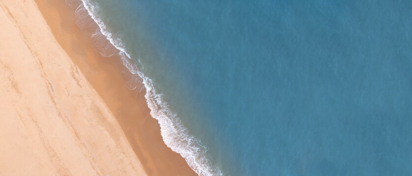 Aerial Tropical Beach Background with Turquoise Ocean Waves and Sandy Coastline