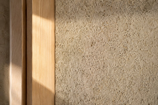 Hemp Straw Plaster Wall Close Up Timber Frame Edge Warm Side Light