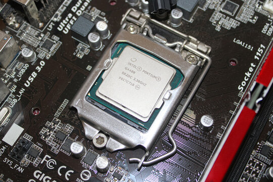 Intel Pentium Processor Installed On Motherboard Socket. September 4, 2023, in Sukoharjo, Indonesia