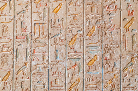 Egyptian hieroglyphics in a tomb, The valley of the Kings, Luxor, Egypt.