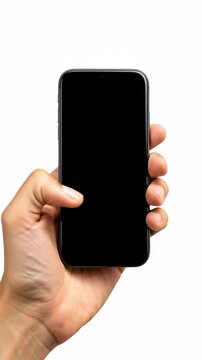 Hand holds smartphone with black screen. Phone stands upright against plain white background. Finger tips support device edges gently. Screen remains dark, no visible brand or logo